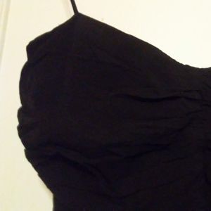 Rusched cocktail dress with feathers